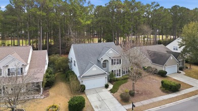 Situated on a large lot with golf course views, this 4-bedroom on Pinecrest Golf Course in South Carolina - for sale on GolfHomes.com, golf home, golf lot
