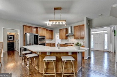 Poised on a 1/3-acre corner lot on a quiet cul-de-sac, this on Hamilton Mill Golf Club in Georgia - for sale on GolfHomes.com, golf home, golf lot