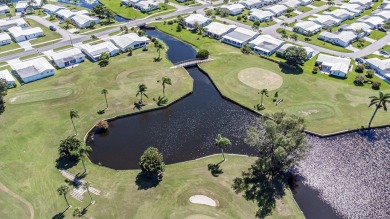 Indulge in the epitome of South Florida living! Imagine waking on Leisureville Community Golf Course in Florida - for sale on GolfHomes.com, golf home, golf lot