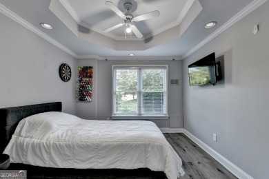 Poised on a 1/3-acre corner lot on a quiet cul-de-sac, this on Hamilton Mill Golf Club in Georgia - for sale on GolfHomes.com, golf home, golf lot