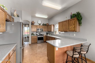 Start living in this inviting 3-bed, 2-bath home perfectly on Coyote Lakes Golf Club in Arizona - for sale on GolfHomes.com, golf home, golf lot