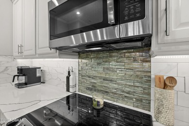 Nestled inside the guard gated, golf-cart-friendly community of on Plantation Bay Golf and Country Club in Florida - for sale on GolfHomes.com, golf home, golf lot