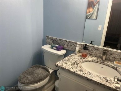 OK TO FINANCE IN THIS BUILDING *****SECOND FLOOR  UNIT. There is on Hillsboro Pines Golf in Florida - for sale on GolfHomes.com, golf home, golf lot