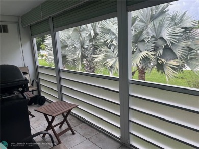 OK TO FINANCE IN THIS BUILDING *****SECOND FLOOR  UNIT. There is on Hillsboro Pines Golf in Florida - for sale on GolfHomes.com, golf home, golf lot