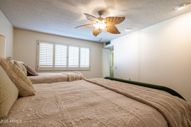 Love where you live in this mid-century modern 2 bedroom 2 bath on Sun City Lakes West and East in Arizona - for sale on GolfHomes.com, golf home, golf lot