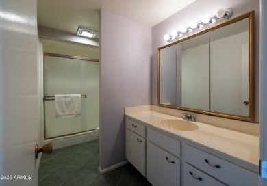 Love where you live in this mid-century modern 2 bedroom 2 bath on Sun City Lakes West and East in Arizona - for sale on GolfHomes.com, golf home, golf lot