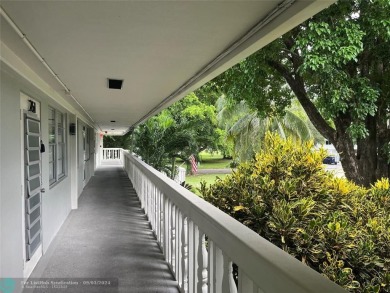OK TO FINANCE IN THIS BUILDING *****SECOND FLOOR  UNIT. There is on Hillsboro Pines Golf in Florida - for sale on GolfHomes.com, golf home, golf lot