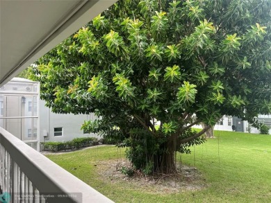 OK TO FINANCE IN THIS BUILDING *****SECOND FLOOR  UNIT. There is on Hillsboro Pines Golf in Florida - for sale on GolfHomes.com, golf home, golf lot