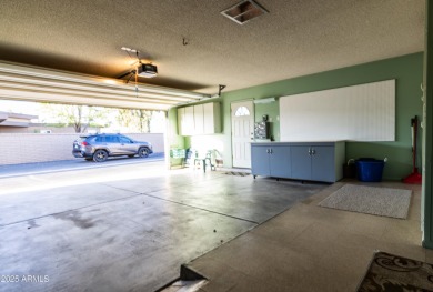 Love where you live in this mid-century modern 2 bedroom 2 bath on Sun City Lakes West and East in Arizona - for sale on GolfHomes.com, golf home, golf lot