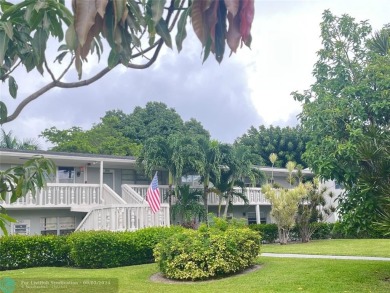 OK TO FINANCE IN THIS BUILDING *****SECOND FLOOR  UNIT. There is on Hillsboro Pines Golf in Florida - for sale on GolfHomes.com, golf home, golf lot