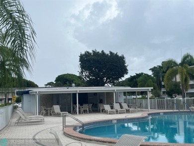 OK TO FINANCE IN THIS BUILDING *****SECOND FLOOR  UNIT. There is on Hillsboro Pines Golf in Florida - for sale on GolfHomes.com, golf home, golf lot