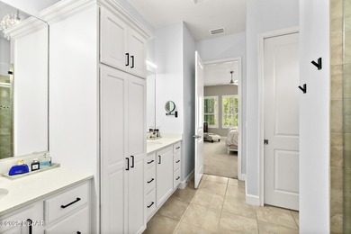 Nestled inside the guard gated, golf-cart-friendly community of on Plantation Bay Golf and Country Club in Florida - for sale on GolfHomes.com, golf home, golf lot