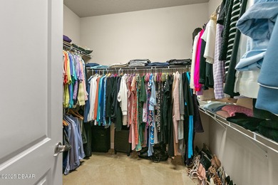 Nestled inside the guard gated, golf-cart-friendly community of on Plantation Bay Golf and Country Club in Florida - for sale on GolfHomes.com, golf home, golf lot