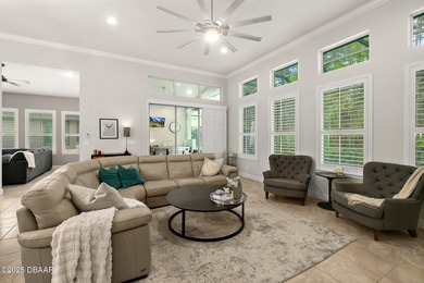 Nestled inside the guard gated, golf-cart-friendly community of on Plantation Bay Golf and Country Club in Florida - for sale on GolfHomes.com, golf home, golf lot