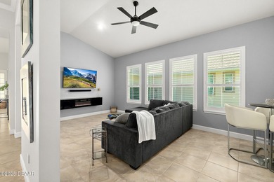 Nestled inside the guard gated, golf-cart-friendly community of on Plantation Bay Golf and Country Club in Florida - for sale on GolfHomes.com, golf home, golf lot