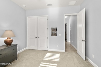 Nestled inside the guard gated, golf-cart-friendly community of on Plantation Bay Golf and Country Club in Florida - for sale on GolfHomes.com, golf home, golf lot