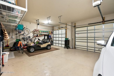 Nestled inside the guard gated, golf-cart-friendly community of on Plantation Bay Golf and Country Club in Florida - for sale on GolfHomes.com, golf home, golf lot