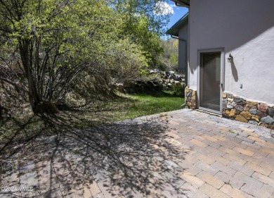 Indulge in breathtaking vistas from the expansive, airy living on Eagle Vail Golf Course in Colorado - for sale on GolfHomes.com, golf home, golf lot