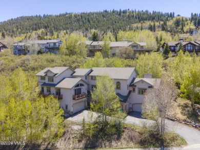 Indulge in breathtaking vistas from the expansive, airy living on Eagle Vail Golf Course in Colorado - for sale on GolfHomes.com, golf home, golf lot