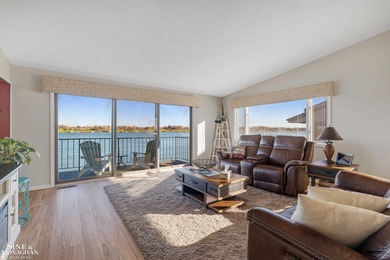 Rare Find - Waterfront Condo in River Colony Enjoy breathtaking on St Clair River Country Club in Michigan - for sale on GolfHomes.com, golf home, golf lot