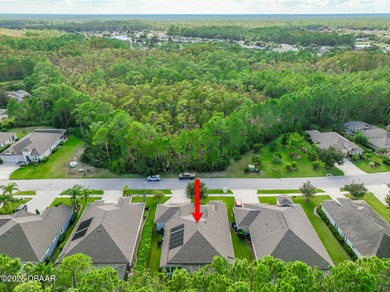 Nestled inside the guard gated, golf-cart-friendly community of on Plantation Bay Golf and Country Club in Florida - for sale on GolfHomes.com, golf home, golf lot