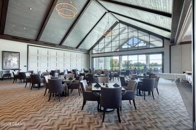 Nestled inside the guard gated, golf-cart-friendly community of on Plantation Bay Golf and Country Club in Florida - for sale on GolfHomes.com, golf home, golf lot