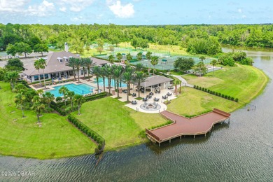 Nestled inside the guard gated, golf-cart-friendly community of on Plantation Bay Golf and Country Club in Florida - for sale on GolfHomes.com, golf home, golf lot