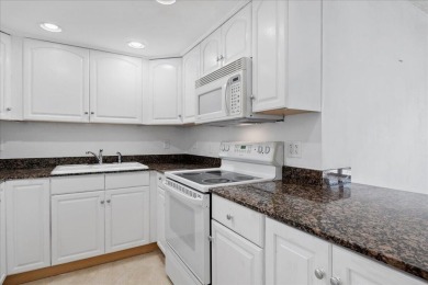 Experience resort-style living at Gemini Condominiums in North on North Palm Beach Country Club in Florida - for sale on GolfHomes.com, golf home, golf lot