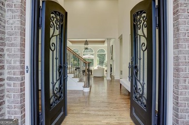Exquisite 5-Bedroom, 5-Bath Brick Executive Estate with on Laurel Springs Golf Club in Georgia - for sale on GolfHomes.com, golf home, golf lot