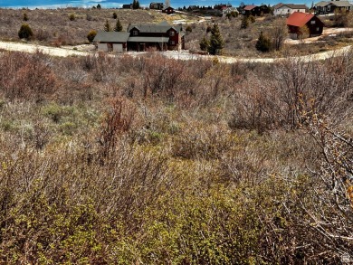 Make your move to Bear Lake, this building lot has stunning on Bear Lake West Golf and Country Club in Idaho - for sale on GolfHomes.com, golf home, golf lot