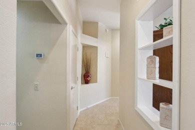 This Payson model was expanded adding extra living space and an on Corte Bella Golf Club in Arizona - for sale on GolfHomes.com, golf home, golf lot