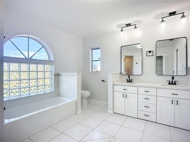 Completely transformed in 2024, this stunning 4-bedroom on Pinemoor West Golf Club in Florida - for sale on GolfHomes.com, golf home, golf lot