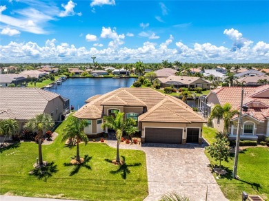 Stunning WATERFRONT custom Pool Home built by DM Dean Custom on Twin Isles Country Club in Florida - for sale on GolfHomes.com, golf home, golf lot