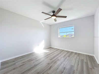 Completely transformed in 2024, this stunning 4-bedroom on Pinemoor West Golf Club in Florida - for sale on GolfHomes.com, golf home, golf lot