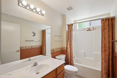 This Payson model was expanded adding extra living space and an on Corte Bella Golf Club in Arizona - for sale on GolfHomes.com, golf home, golf lot