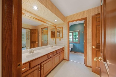 Tucked away in the heart of Muirfield Village, this stately on Muirfield Village Golf Club in Ohio - for sale on GolfHomes.com, golf home, golf lot