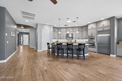 This is a 360 degree mountain view home in Verrado's gated on Verrado Golf Club - Victory in Arizona - for sale on GolfHomes.com, golf home, golf lot