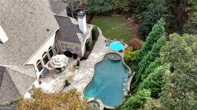 Exquisite 5-Bedroom, 5-Bath Brick Executive Estate with on Laurel Springs Golf Club in Georgia - for sale on GolfHomes.com, golf home, golf lot