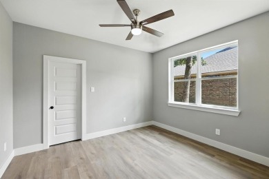 This contemporary - modern 3 bedroom, 2 bath home is designed on Star Harbor Golf Club in Texas - for sale on GolfHomes.com, golf home, golf lot