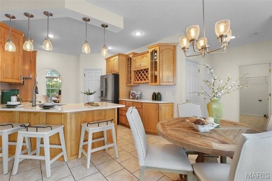 Welcome to resort-style living in this lovely custom ranch with on Raintree Country Club in Missouri - for sale on GolfHomes.com, golf home, golf lot