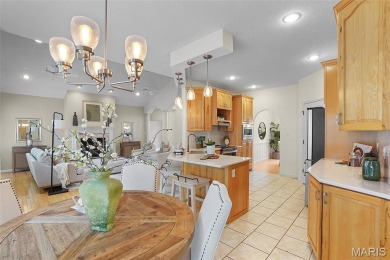 Welcome to resort-style living in this lovely custom ranch with on Raintree Country Club in Missouri - for sale on GolfHomes.com, golf home, golf lot