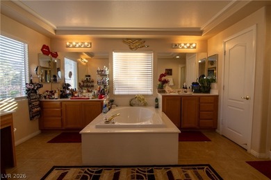 394 Gatlinburg Ct is a luxury residence located on a cul-de-sac on Dragon Ridge Country Club in Nevada - for sale on GolfHomes.com, golf home, golf lot