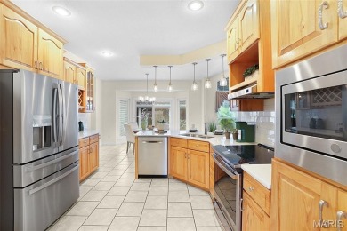 Welcome to resort-style living in this lovely custom ranch with on Raintree Country Club in Missouri - for sale on GolfHomes.com, golf home, golf lot