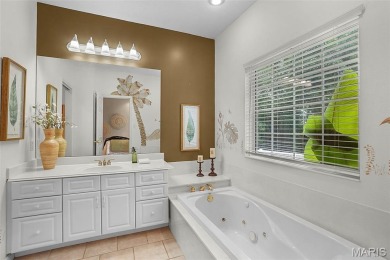 Welcome to resort-style living in this lovely custom ranch with on Raintree Country Club in Missouri - for sale on GolfHomes.com, golf home, golf lot