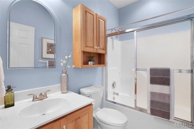 Welcome to resort-style living in this lovely custom ranch with on Raintree Country Club in Missouri - for sale on GolfHomes.com, golf home, golf lot