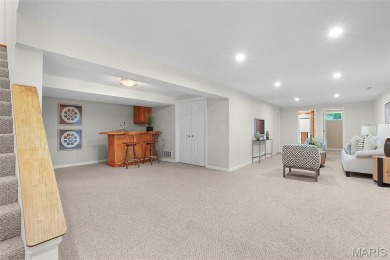 Welcome to resort-style living in this lovely custom ranch with on Raintree Country Club in Missouri - for sale on GolfHomes.com, golf home, golf lot