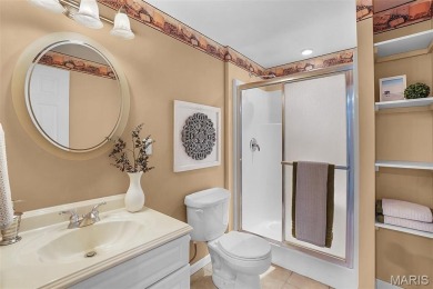 Welcome to resort-style living in this lovely custom ranch with on Raintree Country Club in Missouri - for sale on GolfHomes.com, golf home, golf lot