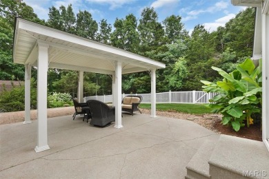 Welcome to resort-style living in this lovely custom ranch with on Raintree Country Club in Missouri - for sale on GolfHomes.com, golf home, golf lot