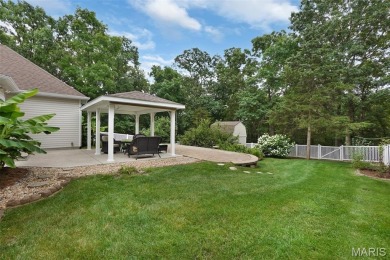Welcome to resort-style living in this lovely custom ranch with on Raintree Country Club in Missouri - for sale on GolfHomes.com, golf home, golf lot