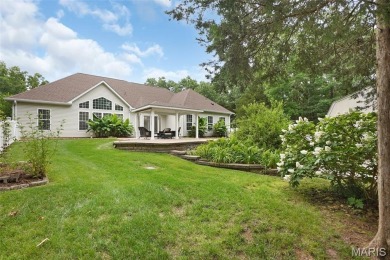 Welcome to resort-style living in this lovely custom ranch with on Raintree Country Club in Missouri - for sale on GolfHomes.com, golf home, golf lot